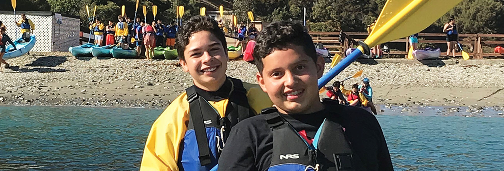 Two boy enjoying canoeing in Catalina